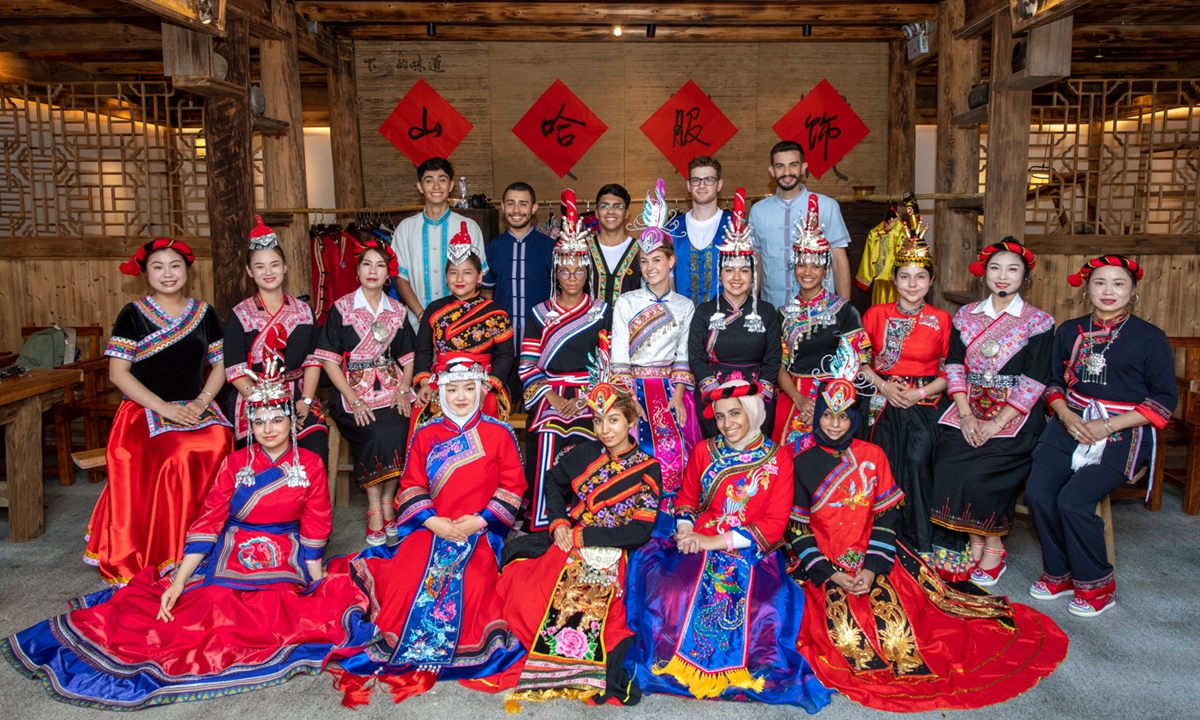 Yasmine Hamed (second from right, front row) and other foreign students pose for a photo with locals in Ningde, Fujian Province. Photo: Courtesy of Yasmine Hamed