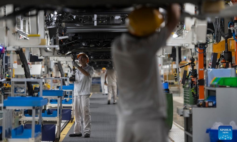 Workers work at an assembly line of Dongfeng Motor Corporation in Wuhan, central China's Hubei Province, Sept. 6, 2024. (Photo: Xinhua)