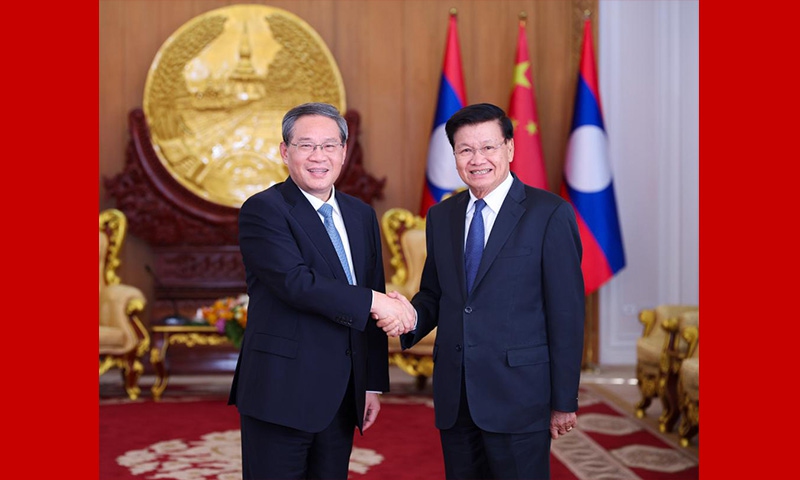 China ready to join Laos in building high-level community with shared ...