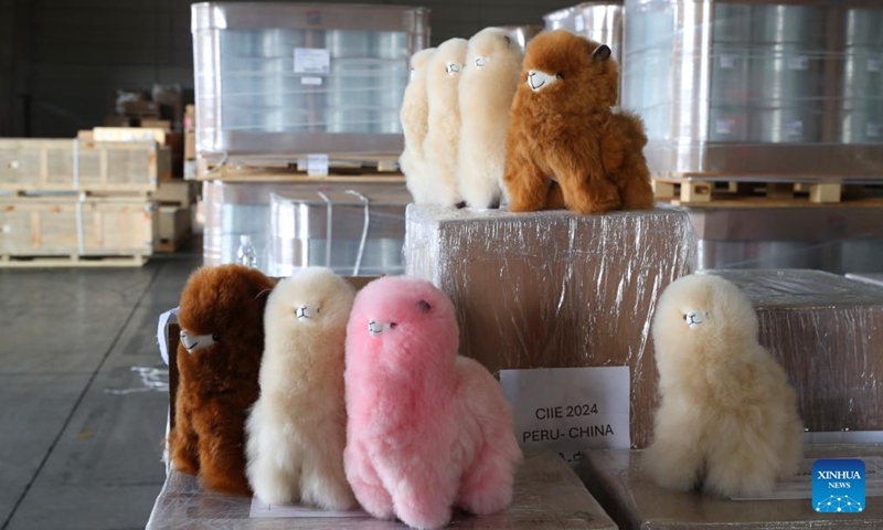 This photo shows Warmpaca alpaca products for the seventh China International Import Expo (CIIE) at a warehouse of COSCO Shipping in Shanghai, east China, Oct. 14, 2024. The seventh CIIE is scheduled to be held from Nov. 5 to 10 in Shanghai. (Photo: Xinhua)