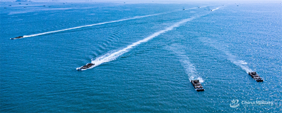 Amphibious assault vehicles attached to an armored unit with a brigade under the Chinese PLA 73rd Group Army sail in formation during a maritime driving training exercise on August 12, 2024. (Photo: China Military Online)