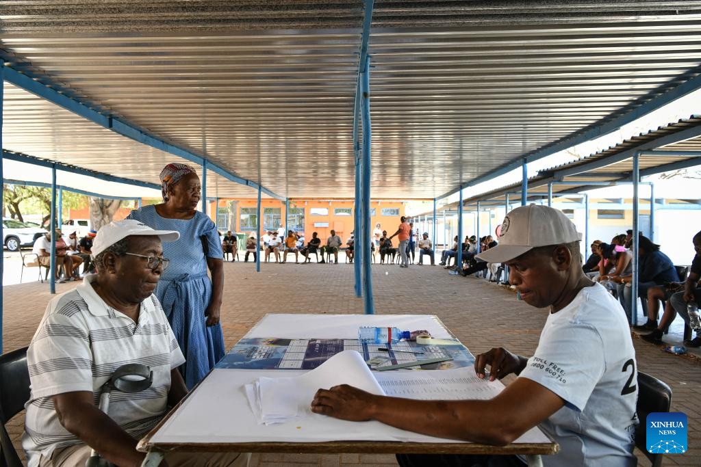 Voters wait outside a polling station in Gaborone, Botswana, Oct. 30, 2024. (Photo: Xinhua)