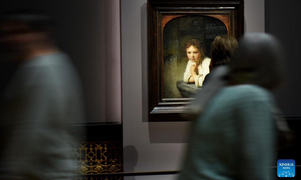 A visitor looks at a Rembrandt's painting work at Art History Museum Vienna, Austria, Nov. 13, 2024. A special exhibition named Rembrandt-Hoogstraten: Colour and Illusion is held here from Oct. 8, 2024 to Jan. 12, 2025. (Photo: Xinhua)