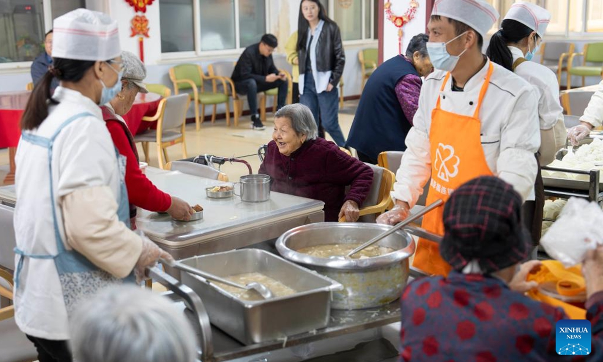 Senior residents have lunch at a residential compound featuring comprehensive elderly services in Rizhao, east China's Shandong Province, Nov. 13, 2024.
The city of Rizhao has in recent years been committed to enhancing elderly care services that integrate medical, fitness, and daily care through at-home and community-based facilities. (Photo: Xinhua)
