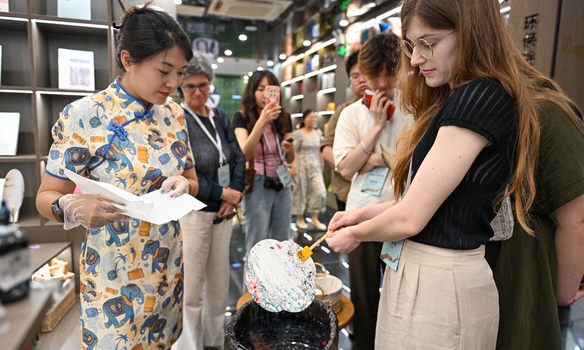 Twenty-three foreigners from nearly 20 countries, including the Chile, visit East China's Jiangsu Province, to experience local intangible cultural heritage, on July 10, 2024. Photo: VCG