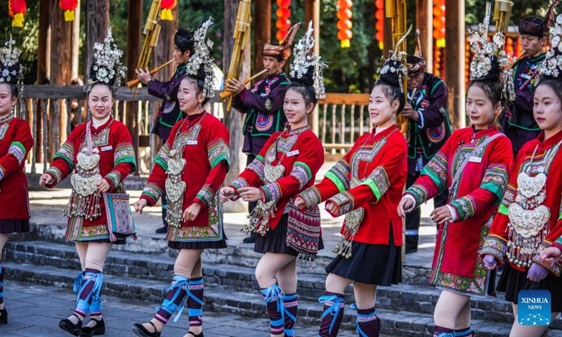 People of Dong ethnic group dance as they celebrate Dongnian festival in Zhaoxing Dong village of Liping County in Qiandongnan Miao and Dong Autonomous Prefecture, southwest China's Guizhou Province, Nov. 29, 2024. Dongnian festival, a traditional festival for harvest and gathering, was enlisted as one of China's national intangible cultural heritages in 2011. (Photo: Xinhua)