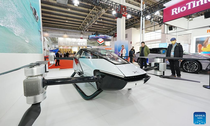Visitors view a passenger-carrying aerial vehicle at the booth of XPENG at the second China International Supply Chain Expo (CISCE) in Beijing, capital of China, Nov. 28, 2024.