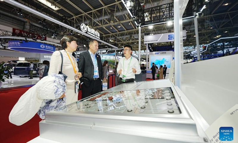 A staff member introduces an innovative battery product at the booth of Contemporary Amperex Technology Co., Ltd. (CATL) at the second China International Supply Chain Expo (CISCE) in Beijing, capital of China, Nov. 28, 2024.