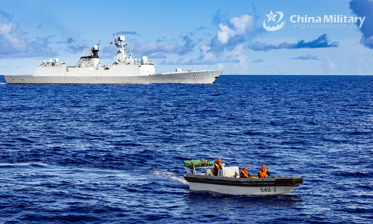 Sailors assigned to a flotilla of the Chinese PLA Navy steer a speed boat away from the guided-missile frigate Changzhou (Hull 549) during a maritime training exercise on November 2, 2024. (eng.chinamil.com.cn/Photo by Wan Haichao)