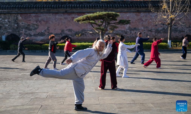 Residents do morning exercises at Yuxu Gong Temple in Shiyan City in central China's Hubei Province, Nov. 29, 2024. Tai Chi, a centuries-old Chinese martial art focusing on both internal and external practices, involves a series of slow, gentle movements and physical postures, a meditative state of mind, and controlled breathing. Statistics show that over 100 million people across more than 150 countries and regions practice Tai Chi, with about 30,000 foreigners traveling to the Wudang Mountain annually to learn and experience it. Photo: Xinhua