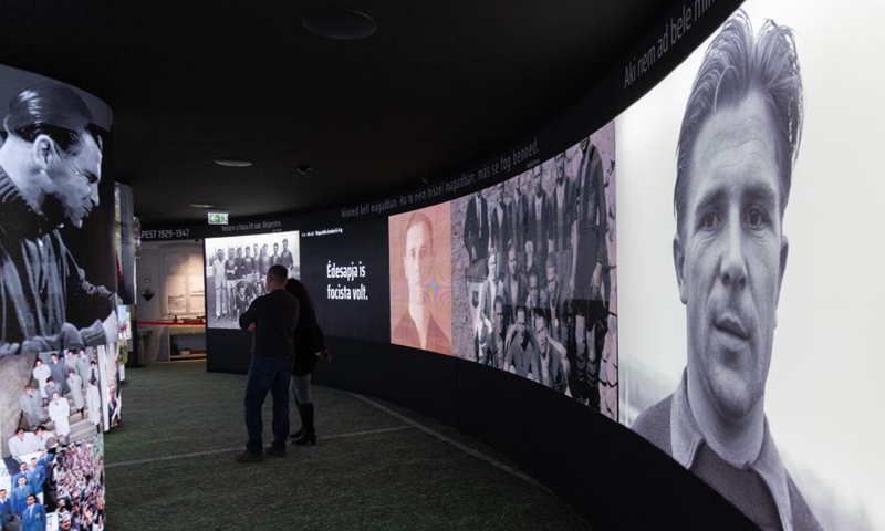 A multi-screen video installation plays Ferenc Puskas' career moments at the newly opened Puskas Museum in Budapest, Hungary on Nov. 30, 2024. The Puskas Museum, named after the former Hungarian football player Ferenc Puskas, was opened in Budapest on Nov. 15, 2024. (Photo: Xinhua)