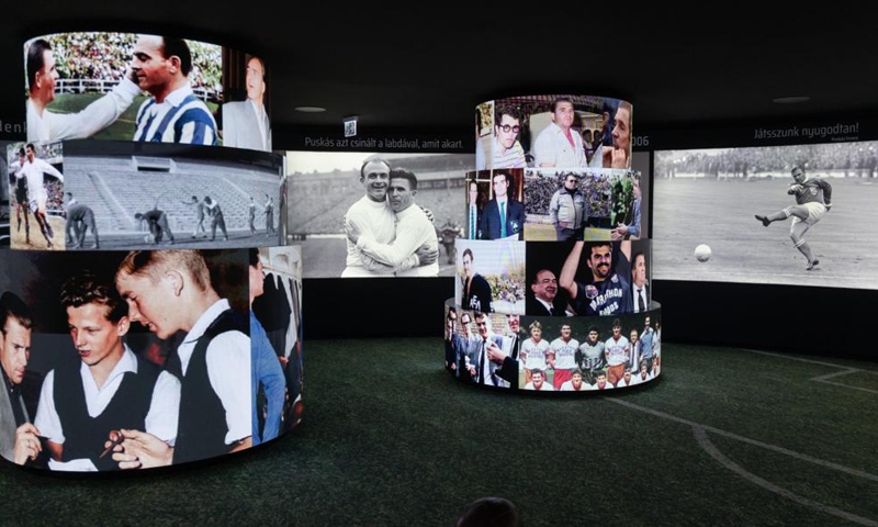 A multi-screen video installation plays Ferenc Puskas' career moments at the newly opened Puskas Museum in Budapest, Hungary on Nov. 30, 2024. The Puskas Museum, named after the former Hungarian football player Ferenc Puskas, was opened in Budapest on Nov. 15, 2024. (Photo: Xinhua)