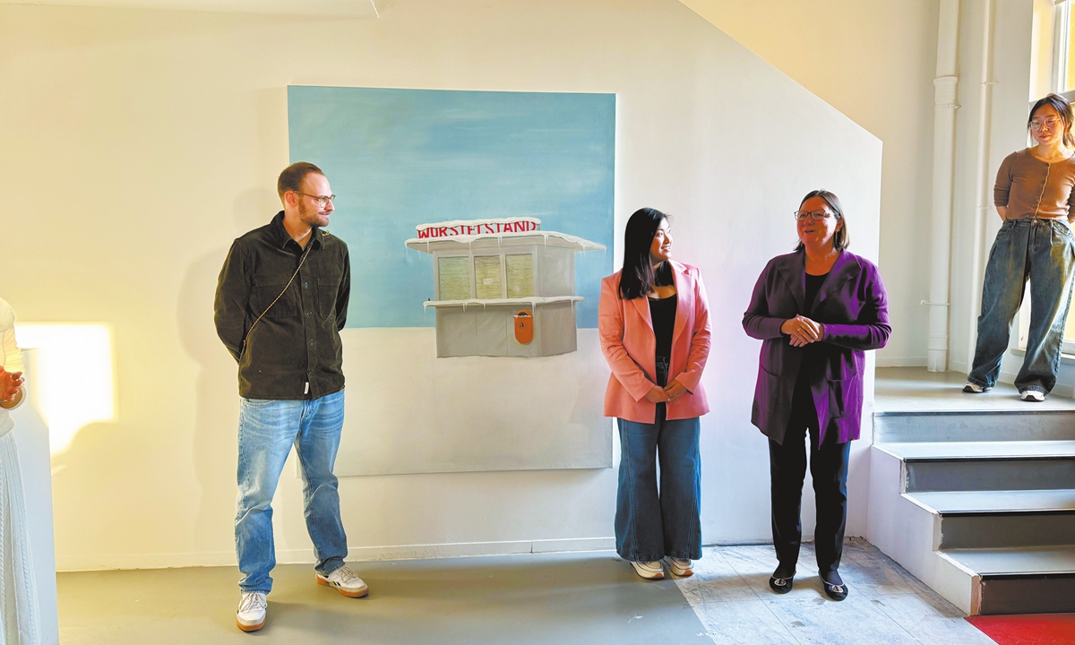 Gudrun Hardiman-Pollross, director of the Austrian Cultural Forum (right) gives her opening remarks at the exhibition in Beijing, on December 1, 2024. Photo: Dong Feng/GT