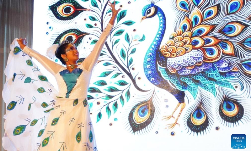 A student performs traditional Chinese dance during the Chinese Food Carnival in Colombo, Sri Lanka, Dec. 4, 2024. The Chinese Food Carnival was held here on Wednesday night, attracting over 200 guests from both China and Sri Lanka. Photo: Xinhua