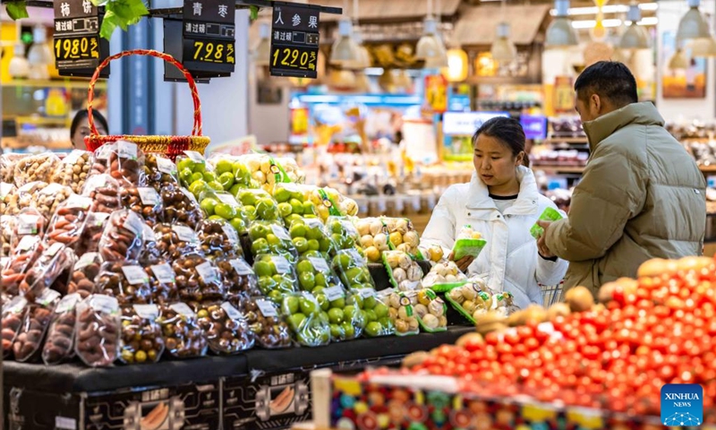 Customers shop at a supermarket in Anshun City, southwest China's Guizhou Province, Dec. 9, 2023. Photo: Xinhua