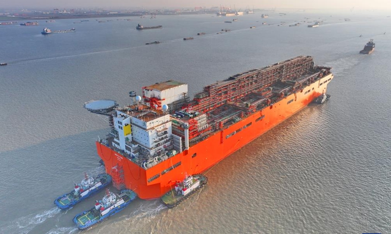 This aerial drone photo taken on Dec. 9, 2024 shows the NGUYA FLNG, a floating liquified natural gas (FLNG) facility, being tugged in the Nantong section of the Yangtze River in east China's Jiangsu Province. (Photo: Xinhua)