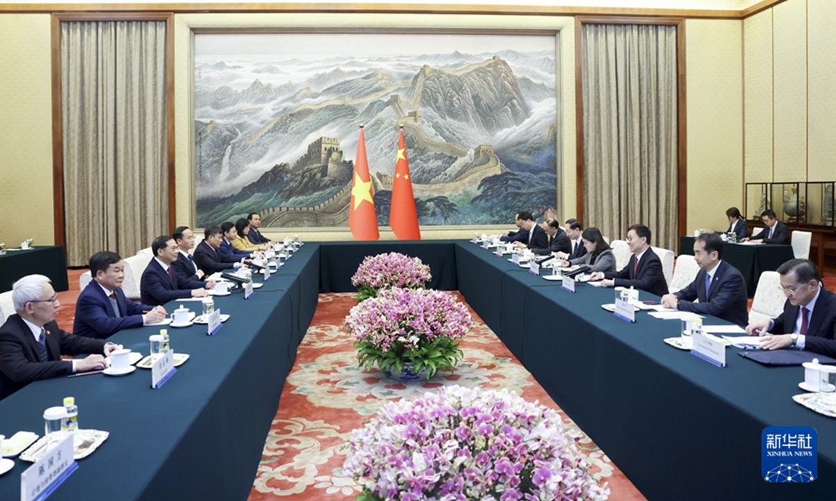 Chinese Vice President Han Zheng met with Deputy Prime Minister and Foreign Minister of Vietnam Bui Thanh Son in Beijing. Photo: Xinhua