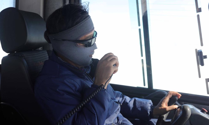 A member of China's 41st Antarctic expedition team drives snowmobile to transport supplies to China's Zhongshan station in Antarctica, Dec. 3, 2024. (Photo: Xinhua)