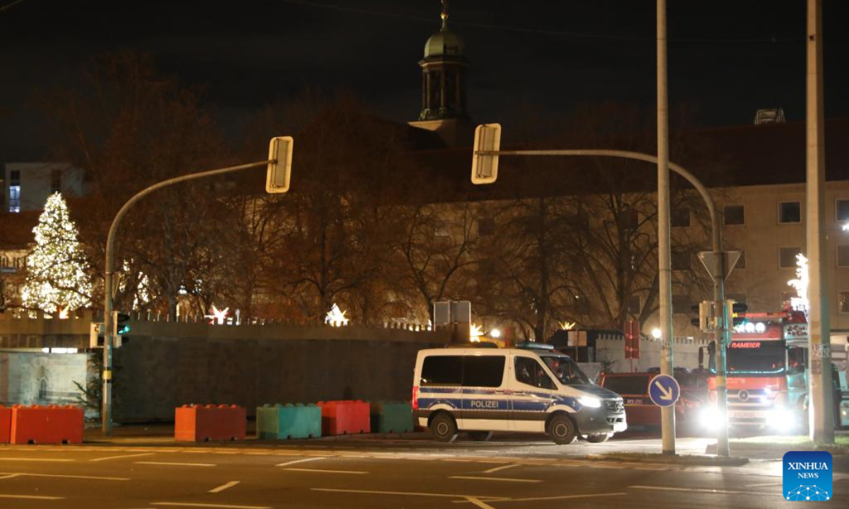 This photo shows a street cordoned off near a Christmas market where a car rammed into a crowd in Magdeburg, Germany, Dec. 21, 2024. A car plowed through a Christmas market in the central German city of Magdeburg on Friday evening, killing at least two people - an adult and a small child - and injuring over 60, Saxony-Anhalt's state premier announced. (Photo:Xinhua)