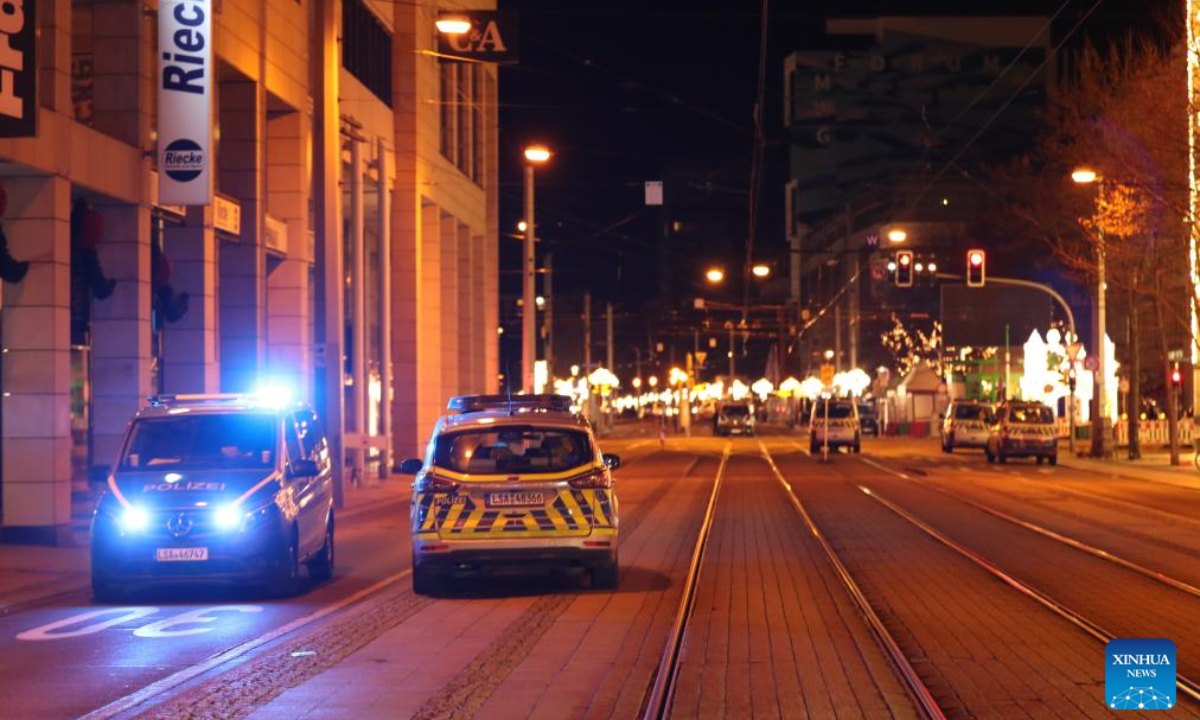 This photo shows a street cordoned off near a Christmas market where a car rammed into a crowd in Magdeburg, Germany, Dec. 21, 2024. A car plowed through a Christmas market in the central German city of Magdeburg on Friday evening, killing at least two people - an adult and a small child - and injuring over 60, Saxony-Anhalt's state premier announced. (Photo:Xinhua)