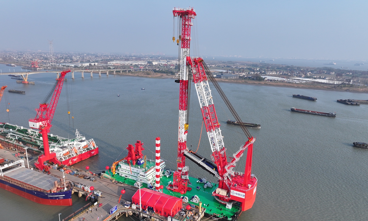 China's first independently developed 110-meter elevated rotating piling vessel is delivered in Yangzhong, East China's Jiangsu Province, on December 18, 2024. This marks a significant achievement in the home production of core piling equipment. The vessel boasts a high degree of intelligence, equipped with a satellite positioning system accurate to the centimeter, enabling precise piling operations. Photo: VCG