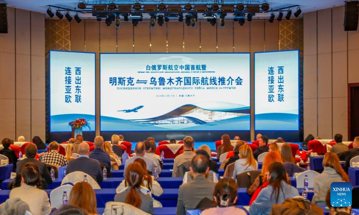 A promotion meeting on a new air route linking Urumqi, capital of northwest China's Xinjiang Uygur Autonomous Region, and Minsk, capital of Belarus, is held in Urumqi, northwest China's Xinjiang Uygur Autonomous Region, Dec. 17, 2024. (Xinhua/Chen Shuo)