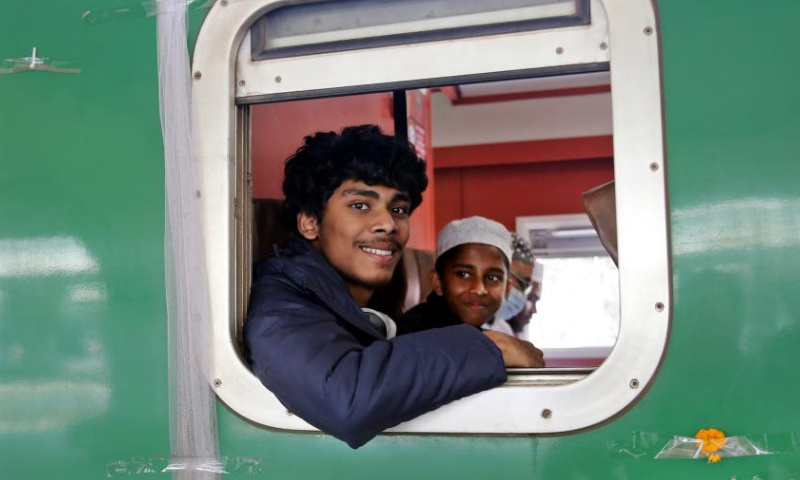 People are pictured inside a train of the Padma Bridge Rail Link Project (PBRLP) at Dhaka station, Dhaka, Bangladesh, Dec. 24, 2024. With the first train decorated with colorful ribbons arriving at Dhaka station, Bangladesh's largest railway Padma Bridge Rail Link Project (PBRLP) officially opened across its entire line to traffic here Tuesday.
The PBRLP, one of the significant projects under the Belt and Road Initiative (BRI) in Bangladesh, was built by the China Railway Group Limited (CREC) and funded by the Export-Import Bank of China.
The railway, known locally as the Dream Road, stretches approximately 170 km. Following its opening, travel time between the capital Dhaka and the southwestern city of Jashore will be reduced from the original 10 hours to just three hours. (Xinhua)