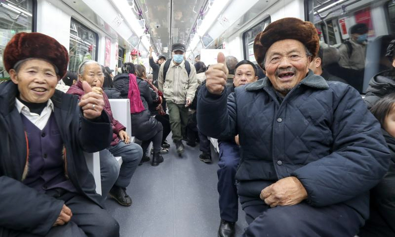 People take a train of S1 line in Guiyang, southwest China's Guizhou Province, Dec. 28, 2024. Guiyang rail S1 line started operation on Saturday. The first phase of S1 line project has a total length of about 30 kilometers and 13 stations, and will become an important passage from Gui'an New Area to the urban area of Guiyang. (Photo by Yuan Fuhong/Xinhua)