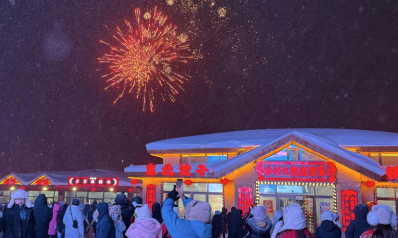 Fireworks are pictured at a snow town scenic area in Hailin City, northeast China's Heilongjiang Province, Dec. 28, 2024. Located in Hailin City of Heilongjiang Province, the scenic area has seen a peak of tourism recently with the average number of daily visitors exceeding 20,000. (Xinhua/Yang Siqi)