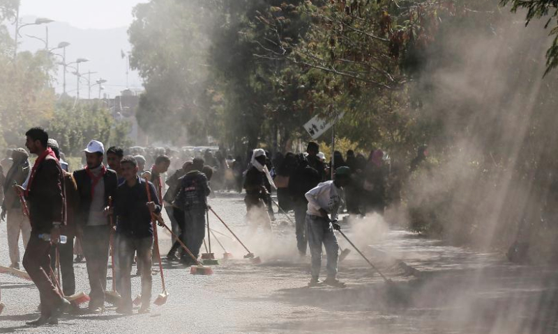 Yemeni locals participate in a comprehensive cleaning campaign launched to welcome the new year in Sanaa, Yemen, on Jan. 1, 2025. (Photo by Mohammed Mohammed/Xinhua)