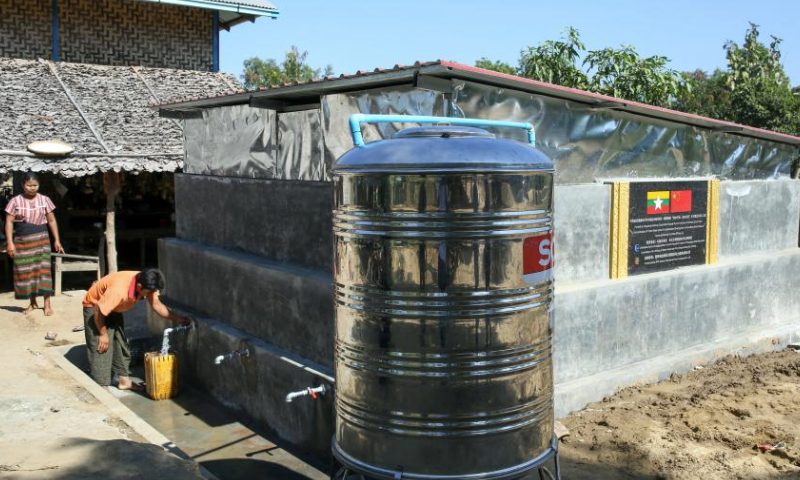 A villager collects water from a water storage tank aided by Lancang-Mekong Cooperation Special Fund at Aung Thar Village in Lewe township, Nay Pyi Taw, Myanmar, Dec. 27, 2024. A ceremony to mark the completion of a rural clean water project, funded by Lancang-Mekong Cooperation Special Fund, was held in Nay Pyi Taw on Friday. (Xinhua/Myo Kyaw Soe)