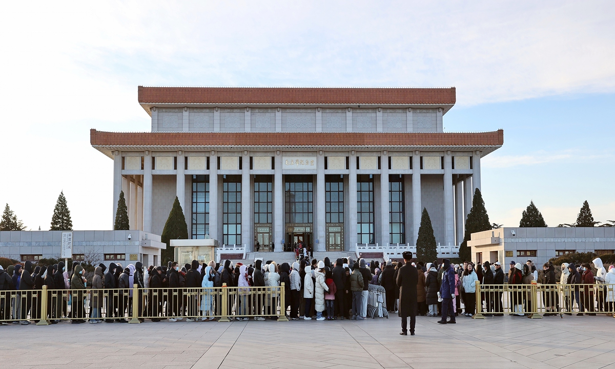 People line up outside the Chairman Mao Memorial Hall at Tiananmen Square in Beijing on December 26, 2024 to pay tribute to late Chinese leader Mao Zedong. The day marks the 131th anniversary of Mao's birth. Photo: VCG