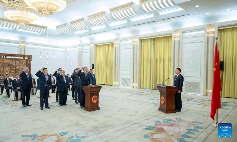 Wu Weihua, vice chairman of the Standing Committee of the 14th National People's Congress (NPC), chairs and oversees an oath-taking ceremony held by the 14th NPC Standing Committee to pledge allegiance to the Constitution at the Great Hall of the People in Beijing, capital of China, Dec. 25, 2024. (Xinhua/Li Tao)