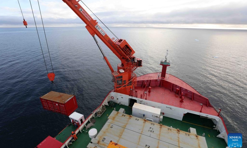 Members of China's 41st Antarctic expedition team unload supplies on China's icebreaker Xuelong 2, or Snow Dragon 2, on Dec. 27, 2024. Chinese research icebreaker Xuelong 2, or Snow Dragon 2, and cargo vessel Yong Sheng, which are on China's 41st Antarctic expedition, arrived at China's Qinling Station in Antarctica on Dec. 25 and carried out unloading operations. (Xinhua/Huang Taoming)