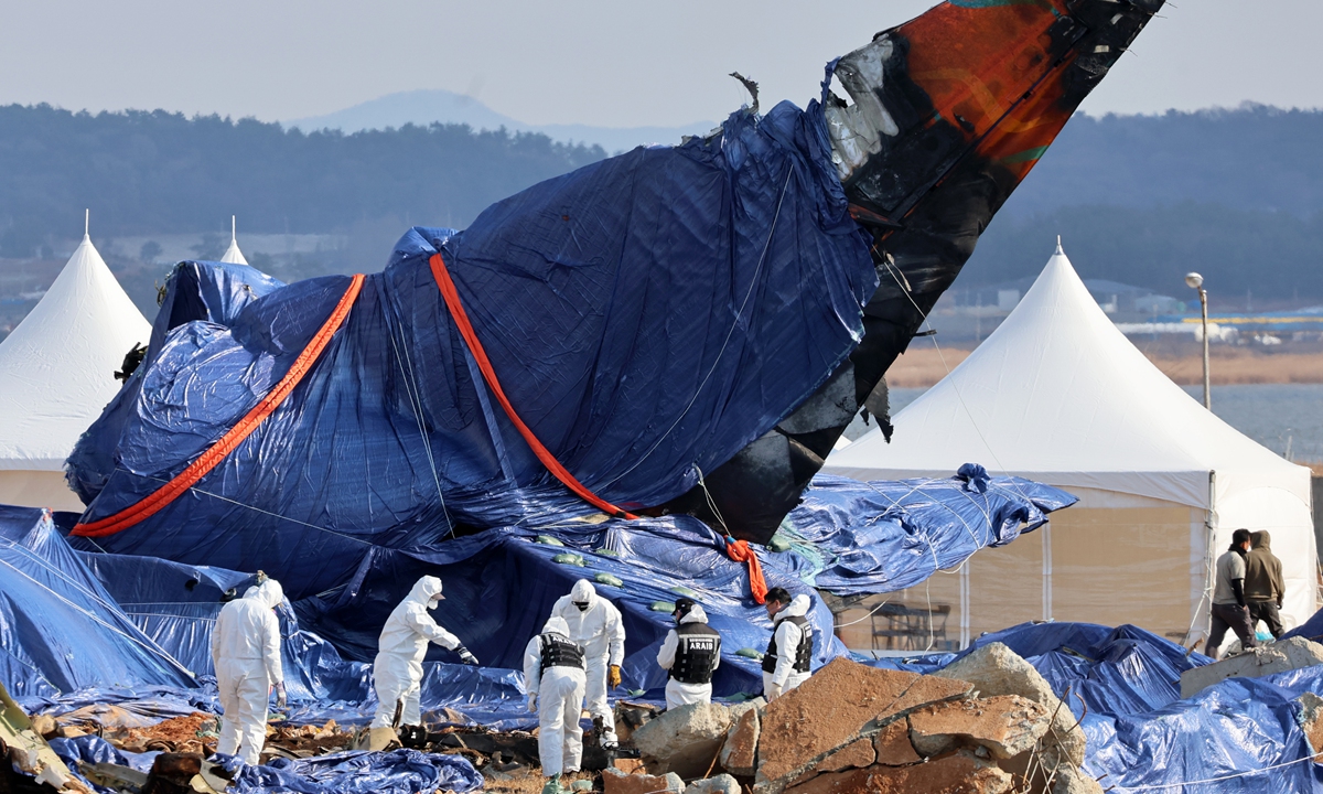 South Korean investigators probe the site of the Jeju Air plane crash at Muan International Airport in South Korea on January 8, 2024. The Boeing 737-800 aircraft crashed while landing at Muan Airport on December 29, killing 179 people. There were two survivors. Photo: VCG