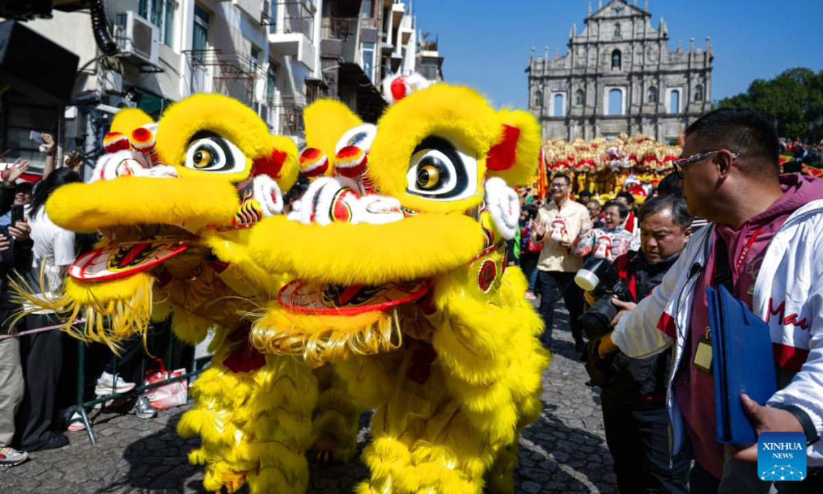 People perform lion dance during a tour event in celebration of the Chinese New Year in front of the Ruins of St. Paul's in Macao, south China, Jan 29, 2025. Photo:Xinhua