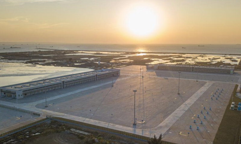 An aerial drone photo shows a construction site of a customs project of the Yangpu Port in the Yangpu Economic Development Zone in Danzhou, south China's Hainan Province, Jan. 12, 2025. (Xinhua/Pu Xiaoxu)