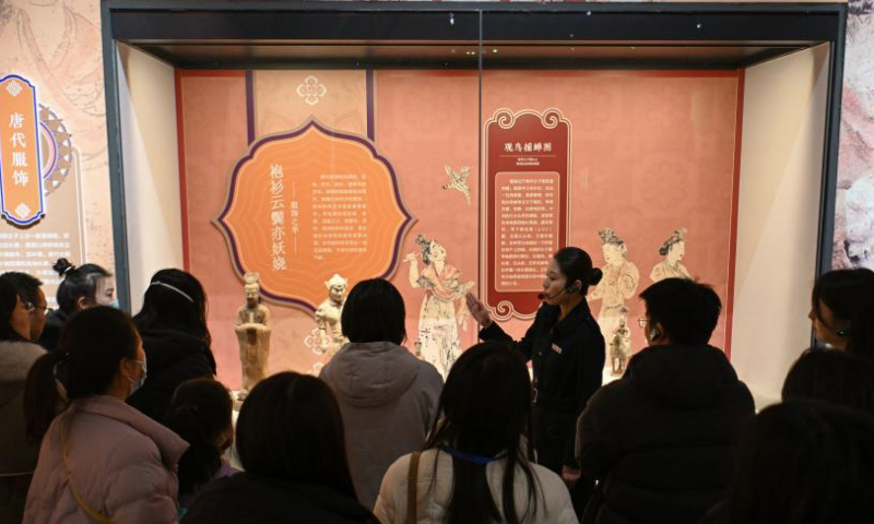 A docent guides the visitors at National Maritime Museum of China in north China's Tianjin, Jan. 15, 2025. An exhibition featuring the highlights of Tang Dynasty (618-907 AD) cultural relics in Shaanxi Province kicked off at National Maritime Museum of China in Tianjin on Wednesday.

The exhibition brings together about 120 pieces (sets) of cultural relics from eight cultural institutions across Shaanxi Province. guide (Xinhua/Sun Fanyue)