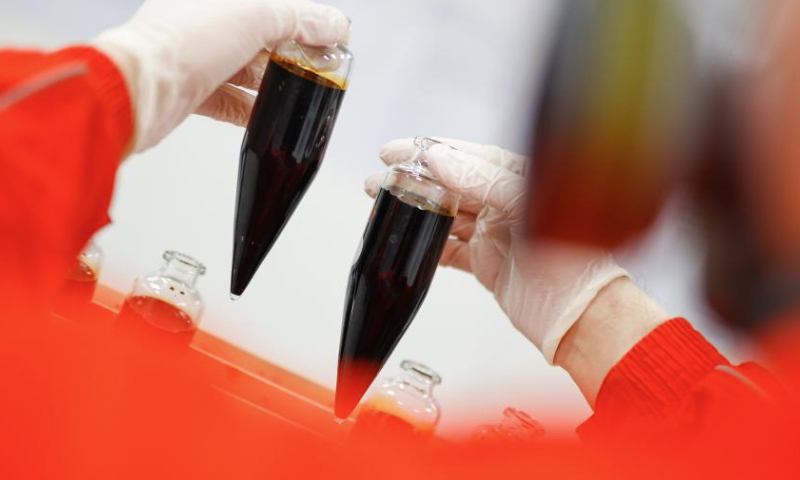 A worker tests crude oil sample at an offshore production platform of the first phase of Bozhong 26-6 oilfield in China's Bohai Sea, Feb. 8, 2025. The first phase of Bozhong 26-6 oilfield, by far the largest metamorphic rock oilfield in the world, commenced production on Friday, according to its developer, the China National Offshore Oil Corporation (CNOOC) Tianjin branch.

The Bozhong 26-6 oilfield is located in the Bohai Sea, about 170 km from north China's Tianjin Municipality, with an average water depth of about 20 meters. Discovered in 2022, its cumulative proven oil and gas reserves has exceeded 200 million cubic meters. (Photo by Du Penghui/Xinhua)