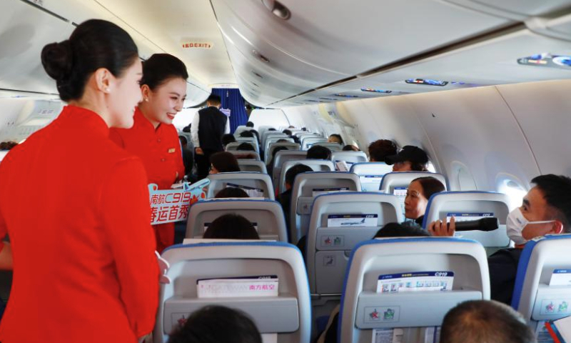 Flight attendants interact with passengers during a themed activity aboard a C919 passenger jet carrying out a flight from Guangzhou to Chengdu, on Jan. 14, 2025.

The China Southern Airlines held a themed activity aboard the C919 aircraft on Tuesday to mark the deployment of the passenger jets for this year's Spring Festival travel rush (also known as chunyun).

All three C919 jets operated by China Southern were deployed on Tuesday, the first day of this year's chunyun, to carry out 10 flights on four routes linking Guangzhou with the cities of Hangzhou, Shanghai, Haikou and Chengdu.

This year's chunyun sees an increased appearance of the home-grown C919 aircraft, a symbol of China's technological and industrial advancement. (Xinhua/Wang Ruiping)