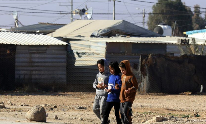 Syrian refugees are seen at Zaatari refugee camp in Jordan, Jan. 18, 2025. Zaatari refugee camp, which is located in north of Jordan, was officially put into use in 2012. (Photo by Mohammad Abu Ghosh/Xinhua)