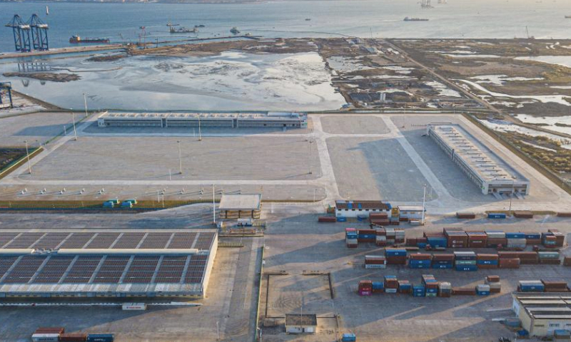 An aerial drone photo shows a construction site of a customs project of the Yangpu Port in the Yangpu Economic Development Zone in Danzhou, south China's Hainan Province, Jan. 12, 2025. (Xinhua/Pu Xiaoxu)