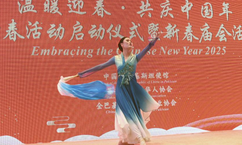 A girl performs during an event welcoming the Chinese New Year in Islamabad, capital of Pakistan, on Jan. 11, 2025. An event welcoming the Chinese New Year, or Spring Festival, was held here on Saturday, with over 500 overseas Chinese and Pakistani guests participating. (Xinhua/Ahmad Kamal)