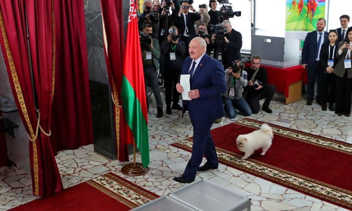 This file photo shows Belarusian President Alexander Lukashenko (C) casting his ballot at a polling station in Minsk, Belarus, Jan. 26, 2025. Belarusian Central Election Commission on Monday officially declared Alexander Lukashenko's victory in the latest presidential elections with 86.82 percent of the votes. (Photo by Henadz Zhinkov/Xinhua)
