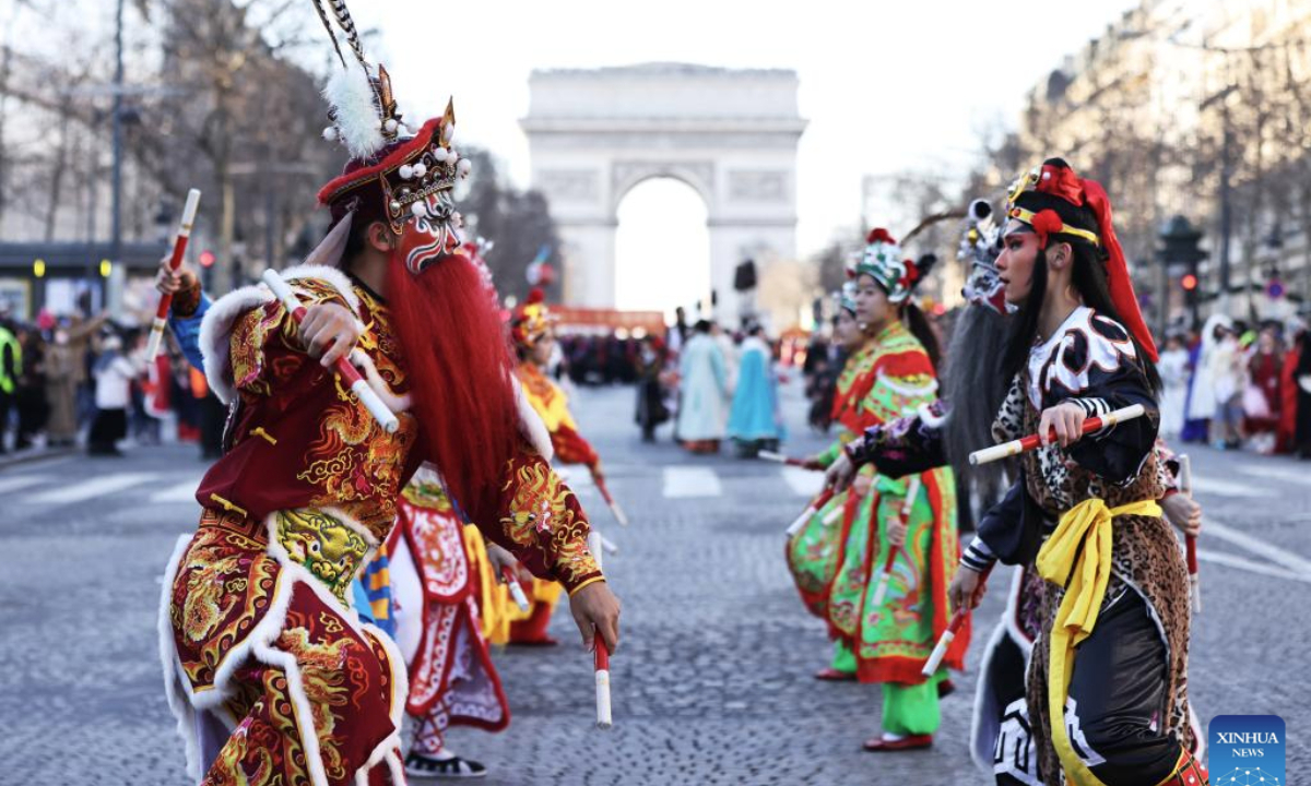 Members of a Yingge team perform Chaoyang Yingge dance during the Spring Festival celebration on the Champs-Elysees avenue in Paris, France, Feb. 2, 2025.
The Yingge dance, or dance to the hero's song, is a form of folk dance popular in south China's Guangdong Province and it was listed as the first batch of China's national intangible cultural heritage in 2006. (Xinhua/Gao Jing)