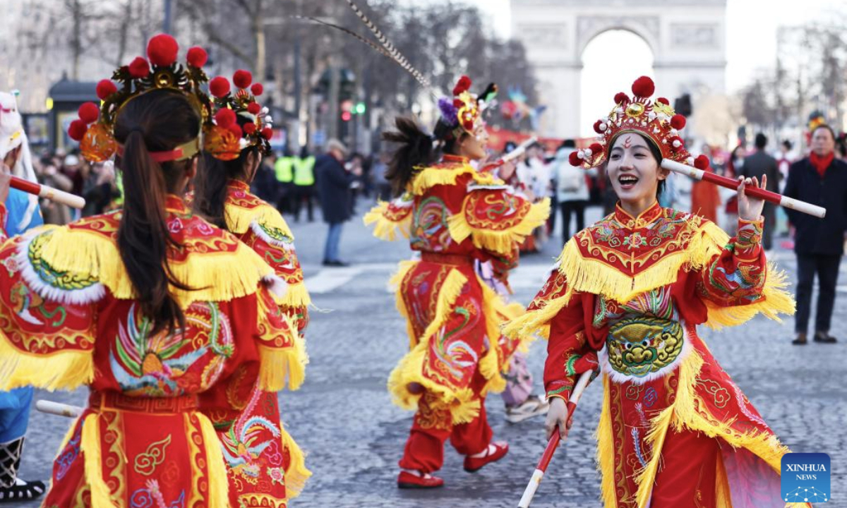 Members of a Yingge team perform Chaoyang Yingge dance during the Spring Festival celebration on the Champs-Elysees avenue in Paris, France, Feb. 2, 2025.
The Yingge dance, or dance to the hero's song, is a form of folk dance popular in south China's Guangdong Province and it was listed as the first batch of China's national intangible cultural heritage in 2006. (Xinhua/Gao Jing)