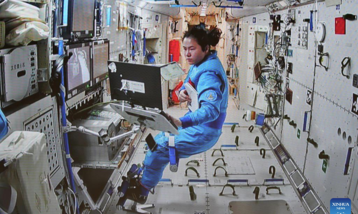 This screen image captured at Beijing Aerospace Control Center on Jan. 20, 2025 shows Shenzhou-19 astronaut Wang Haoze working inside China's orbiting space station. (Xinhua/Liu Fang)