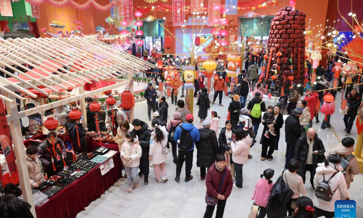 Tourists visit a Spring Festival-themed exhibition at the China Intangible Cultural Heritage Museum in Beijing, capital of China, Jan 29, 2025. Celebrating the Spring Festival in museums has become a new trend across the country. Photo:Xinhua
