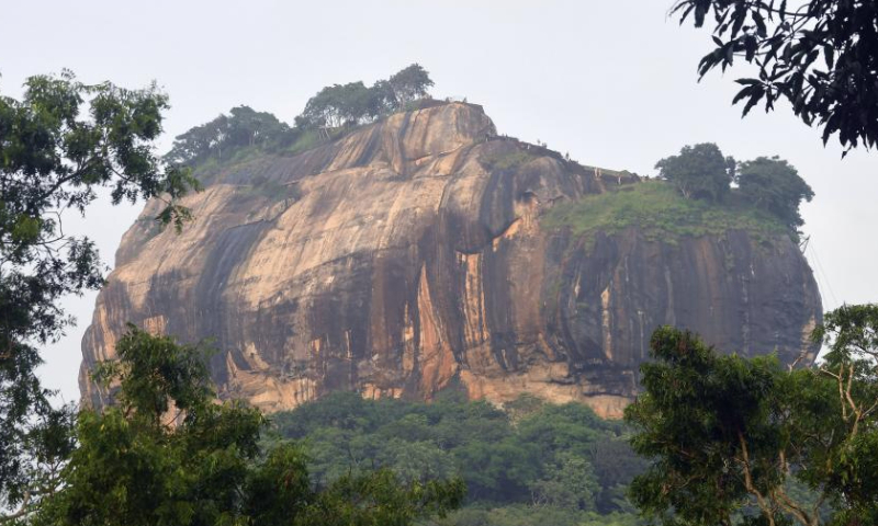 This photo shows the Sigiriya Lion Rock, a popular tourist spot, in Dambulla, Sri Lanka, Jan. 17, 2025. The ancient city of Sigiriya was inscribed as a world heritage site by United Nations Educational, Scientific and Cultural Organizations (UNESCO) in 1982. (Photo by Ajith Perera/Xinhua)