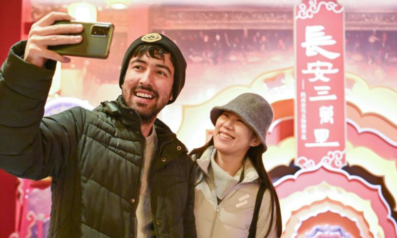 Visitors pose for a selfie at National Maritime Museum of China in north China's Tianjin, Jan. 15, 2025. An exhibition featuring the highlights of Tang Dynasty (618-907 AD) cultural relics in Shaanxi Province kicked off at National Maritime Museum of China in Tianjin on Wednesday.

The exhibition brings together about 120 pieces (sets) of cultural relics from eight cultural institutions across Shaanxi Province. (Xinhua/Sun Fanyue)